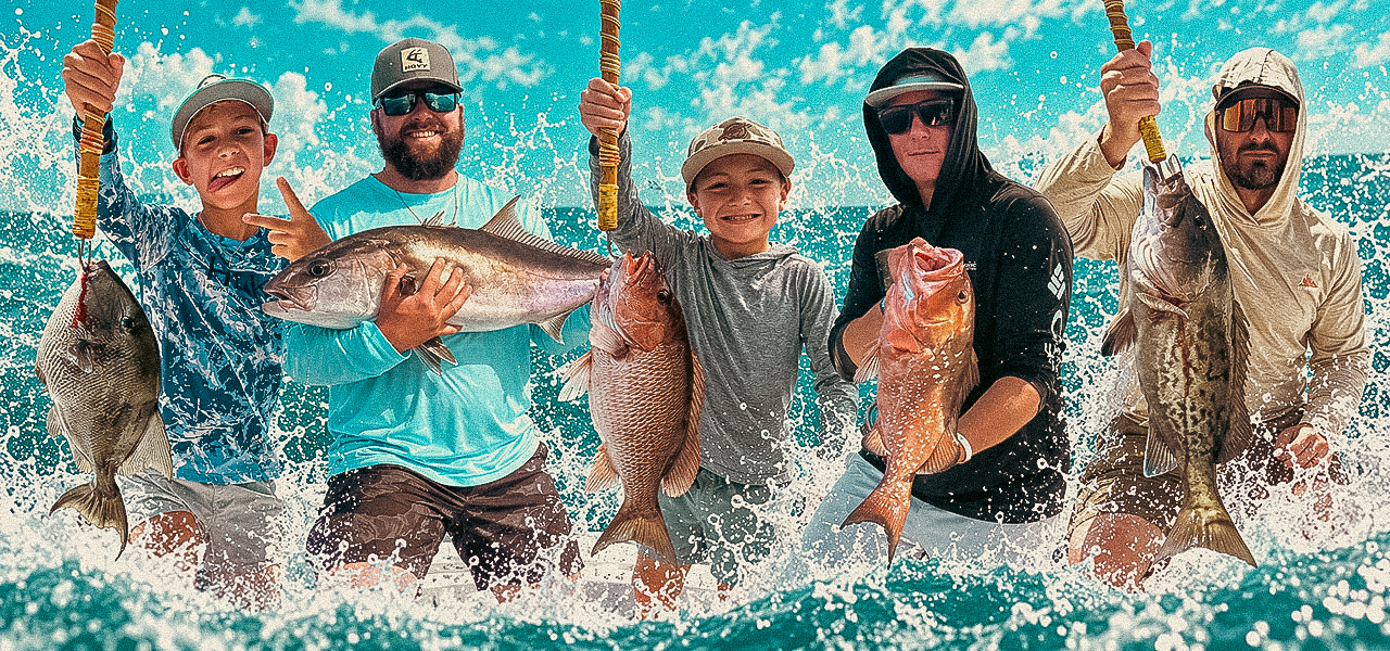 Anglers holding fish caught during a nearshore trip in the Gulf off Destin